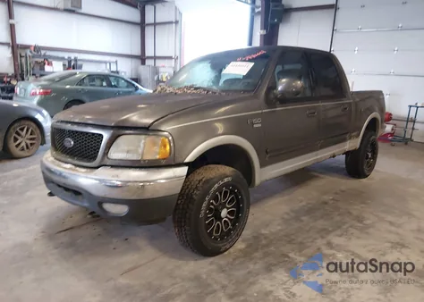 2002 Ford F-150 Lariat/Xlt z USA, uszkodzony, nr VIN 1FTRW08L22KB41910